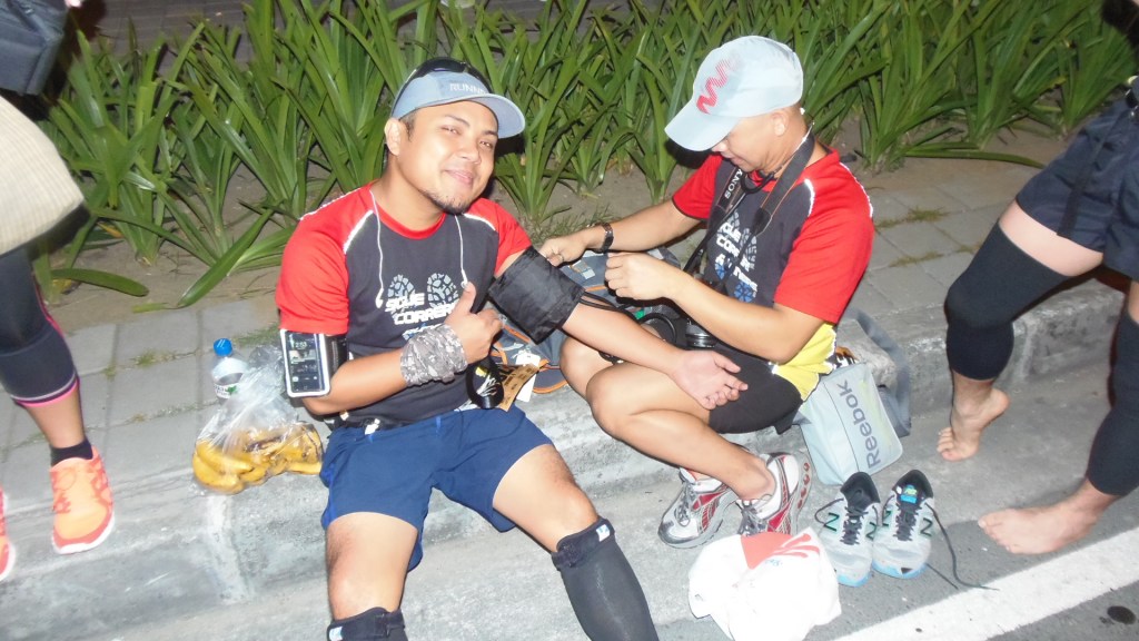 Vampire Runner while taking his Blood Pressure by Rommel Hilaria